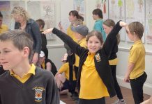 Local young people see their work on the wall at the 'Fantastic Tree for the future' exhibition